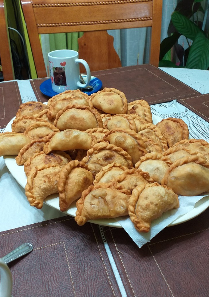 Una foto de Empanadas de machas con camarones y queso mantecoso