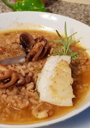 Foto principal de Arroz caldoso con Pescado, Pulpitos y Calamar