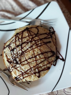 A picture of Pancake and crushed almonds.