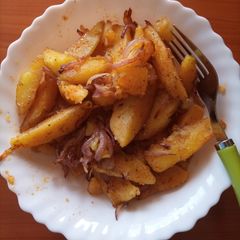A picture of Savory Fried Potatoes Wedges.