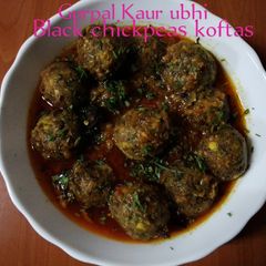 A picture of Black chickpeas kofta curry 🍅🧅🌿🧄🌶️💧.