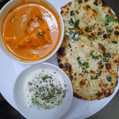 A picture of Shahi Paneer With Butter Naan.