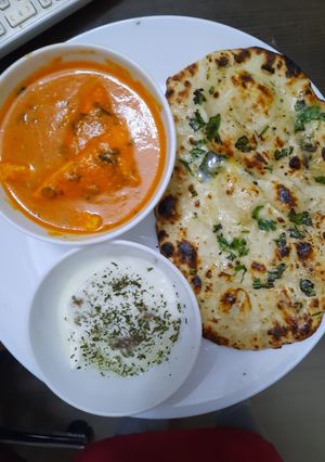 A picture of Shahi Paneer With Butter Naan.