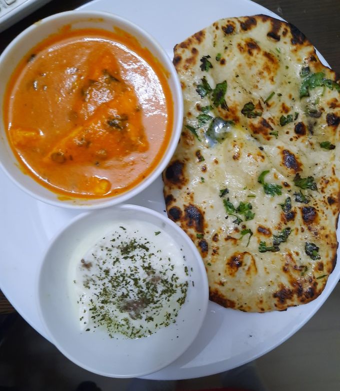 A picture of Shahi Paneer With Butter Naan.