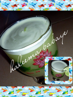 A picture of Mint leaf/ginger/lemon drink.