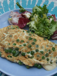 Una foto de Tortillita verde con queso de cabra