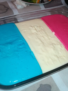 Una foto de Tarta de queso tricolor (cheesecake)