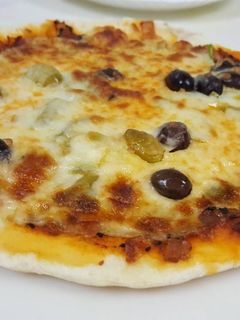 صورة لوصفة بيتزا على الصاج 👍😋