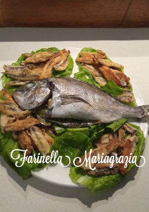 Foto di Raffinatezza del sapore di mare di orata e acciughe in un guscio di insalata km zero 🏡👩‍🍳❤️🦁