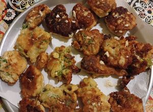 Una foto de Buñuelos de ricotta y apio