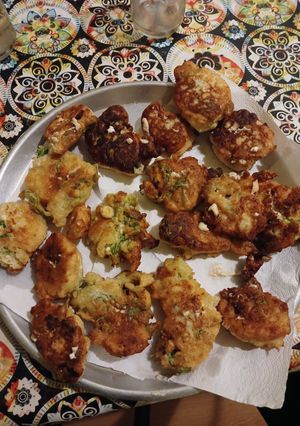 Una foto de Buñuelos de ricotta y apio