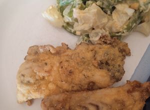 Una foto de Filete de corvina fritas