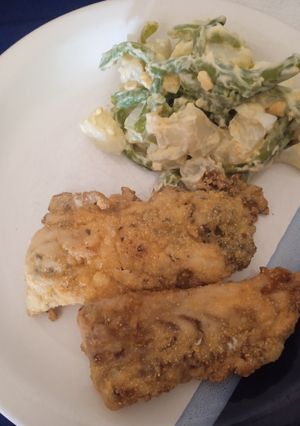 Una foto de Filete de corvina fritas