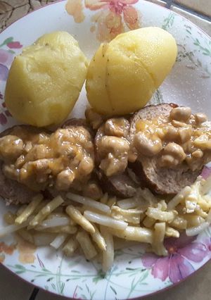 Une photo de Pain de viande à la sauce champignons et pointe d'asperge