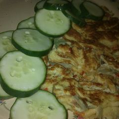 Fried egg garnish with cucumber A picture of Fried egg garnish with cucumber.