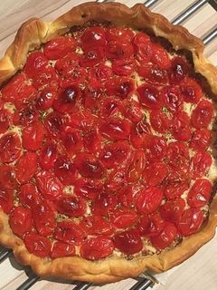 Une photo de Tarte tomates cerises et moutarde