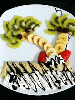 Una foto de Crepes dulces con frutas