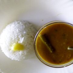 Rice and drumstick sambar A picture of Rice and drumstick sambar.