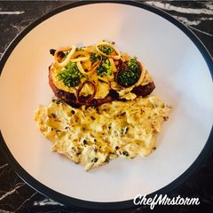 A picture of Smoked Paprika + Fresh Rosemary Chicken with Saffron-Bacon-Mushrooms-Red Onions Cream Sauce.