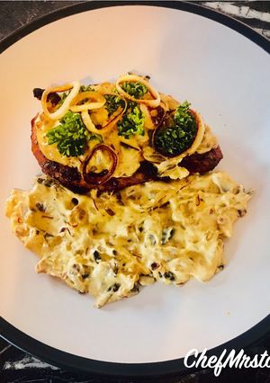 A picture of Smoked Paprika + Fresh Rosemary Chicken with Saffron-Bacon-Mushrooms-Red Onions Cream Sauce.
