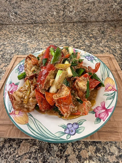 A picture of Stir-fry lobster with ginger and scallion.