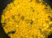 Una foto de arroz con maiz de azafran