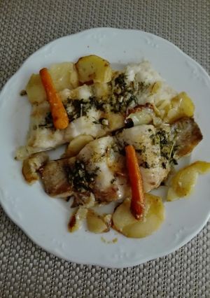 Una foto de Merluza al horno con patatas