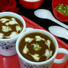 A picture of Spinach carrot tomato soup.
