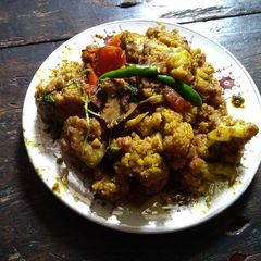 Kopi posto(cauliflower florets and poppy seeds paste stir fry) A picture of Kopi posto(cauliflower florets and poppy seeds paste stir fry).