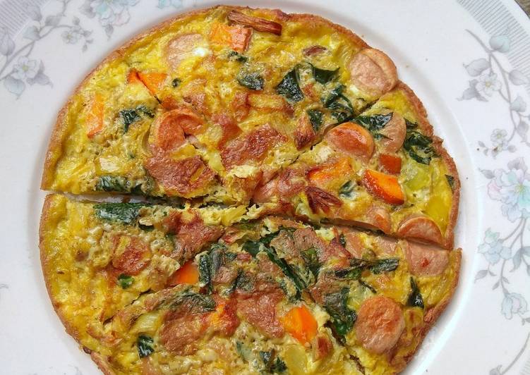 Bagaimana Menyiapkan Spinach omelette yang Lezat Sekali