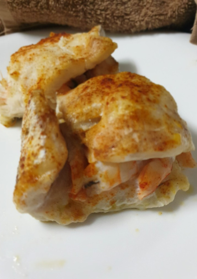 Una foto de Rollitos de merluza con gambón