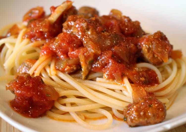 Steps to Make Perfect Slow Cooker Tomato Pasta Sauce with Italian Sausage