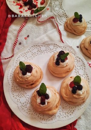 A picture of Pavlova with Hung Curd and Mixed Berry.