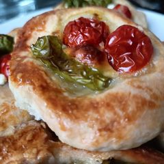 A picture of Feta tomatoes pastry in the oven in 10 minutes.