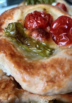 A picture of Feta tomatoes pastry in the oven in 10 minutes.