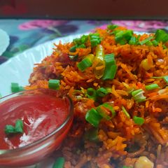 A picture of Pinku panda spicy schezwan rice.