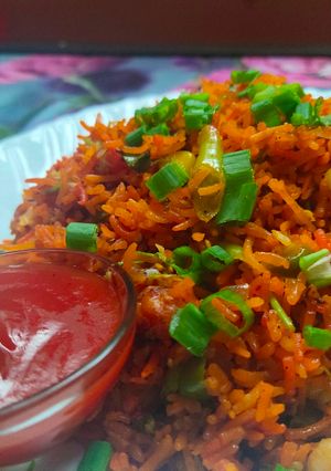 A picture of Pinku panda spicy schezwan rice.