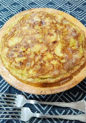 Una foto de Tortilla trufada de patata y cebolla