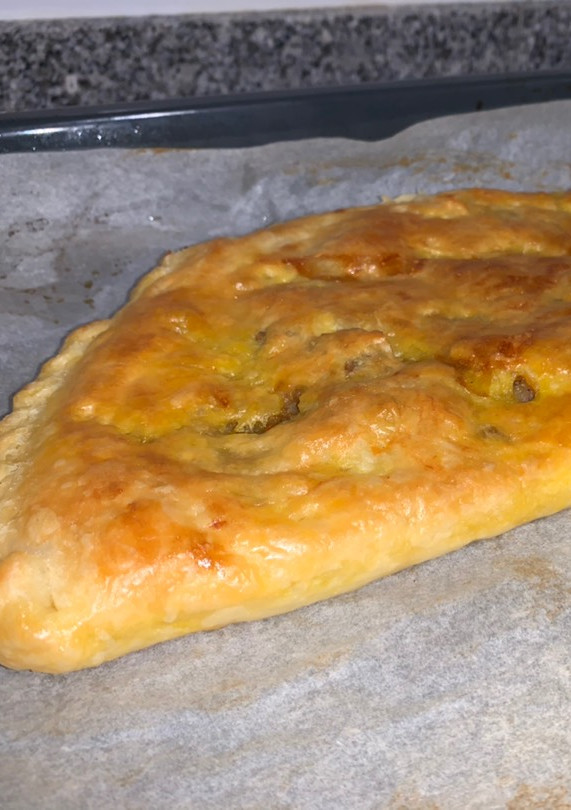 Una foto de Empanada de setas y carne