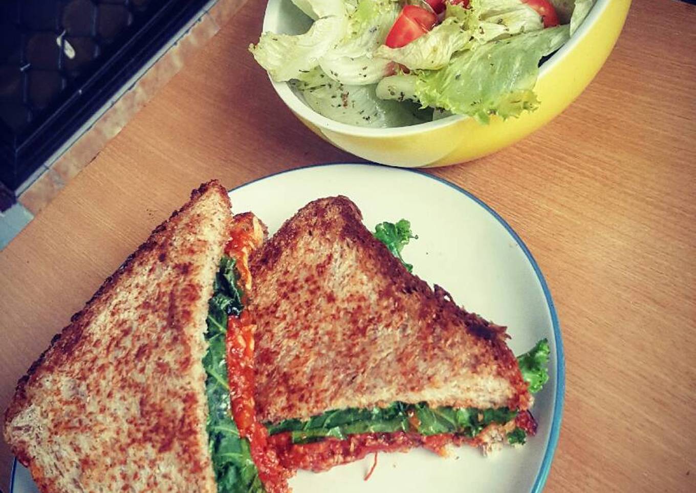 Bolognese sandwich with simple salad