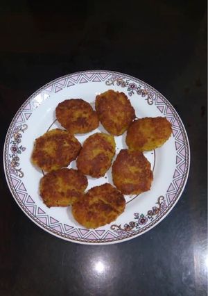 A picture of Narkel - er Bara / Coconut Fritters.