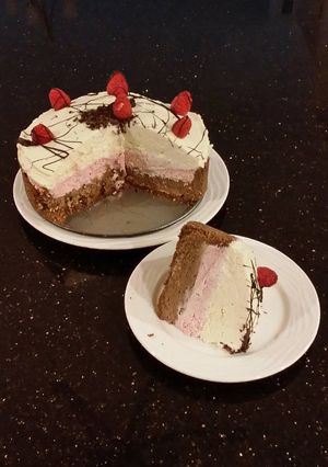 A picture of Chocolate / Rasberry / White Chocolate No Bake Cheesecake.