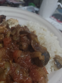 Una foto de Berenjenas vindaloo veganas