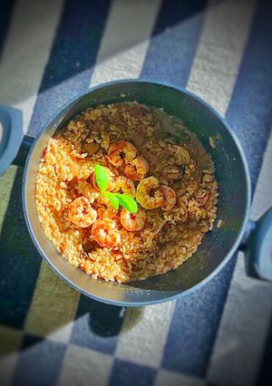 A picture of Porcini Risotto with Shrimps and Mushrooms.