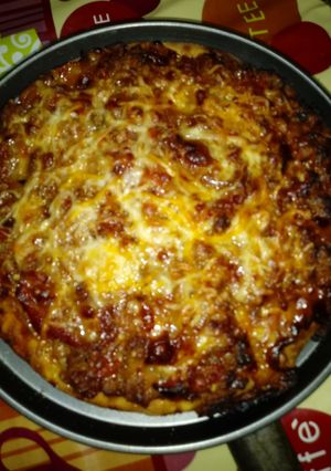 Una foto de Pizza de pimientos rellenos rojos a mi manera