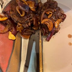 A picture of Salisbury steak supreme.