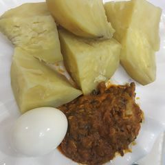 Sweet potatoes with local sauce and egg A picture of Sweet potatoes with local sauce and egg.