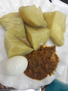 A picture of Sweet potatoes with local sauce and egg.