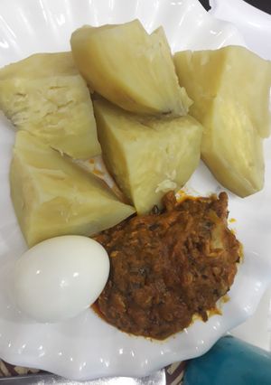 A picture of Sweet potatoes with local sauce and egg.