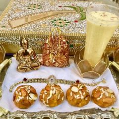A picture of Atta-besan Laddos,Kesar-badam thandai.